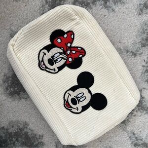Cream small pouch with Mickey & Minnie patches sewn on